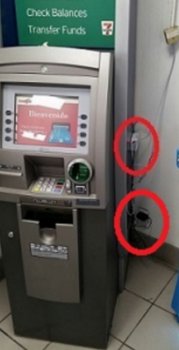 Two network cable card skimming devices, as found attached to this ATM.